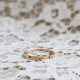 Handgraverad Goldie med Smaragder