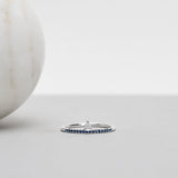Finished: Lily Tiny Diamond Drop Ring in White Gold with Dark Blue Sapphire Row