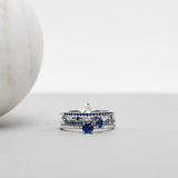 Finished: Lily Tiny Diamond Drop Ring in White Gold with Dark Blue Sapphire Row
