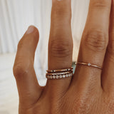 Three Dots Spread Around Ring with Black and White Diamonds