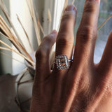 Solitaire Ring with White Topaz and Diamond Halo in White Gold