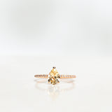 One-Of-A-Kind Drop Sapphire Solitaire Ring with a Light Yellow Sapphire and Diamond Sparkle