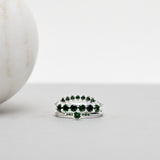 Finished: Idun Curved Diamond Band in White Gold with Dark Green Tourmalines and Diamonds TWVS