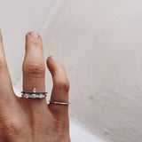 Finished: Lily Tiny Diamond Drop Ring in White Gold with Dark Blue Sapphire Row